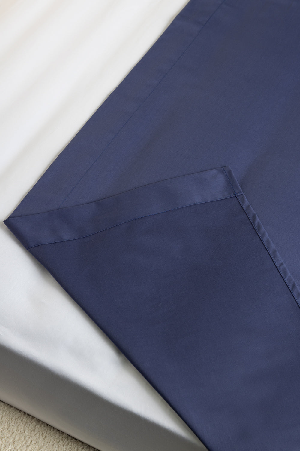 Navy blue fabric on a white background